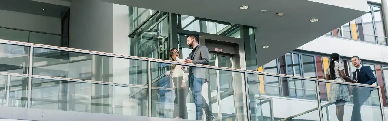 people on office balcony
